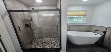 Photos by M&c Global Construction LLC #2 This Severn, MD, bathroom remodel transformed an outdated space with a custom shower, free-standing tub, and m