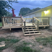Lumber Deck Ranson Ripped out an old deck and parts of her fence and replaced with a fresh deck.
