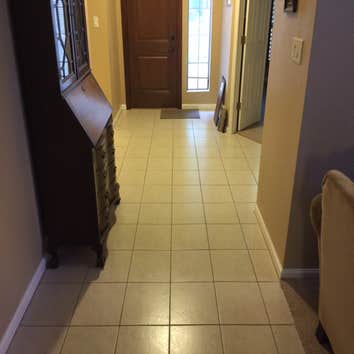 "Before" flooring in entryway