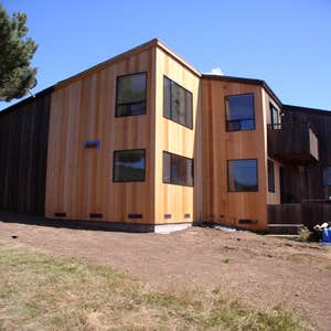 Shanower residence New live / work building to match existing.
2 car garage with drive through, workout room, bathroom.