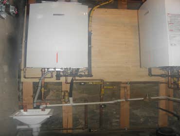 Peter G Sheetz Heating And Air Conditioning Project 1. Some of the jobs are company installed. 1st image - Drexel Hill duplex boiler installation, in 