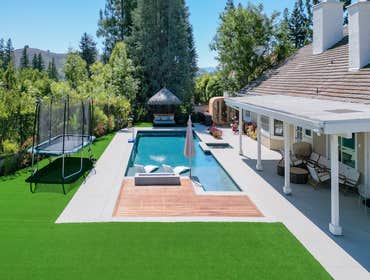 Backyard Remodel - Agoura Hills Complete backyard remodel with pool, spa, multipurpose court, sauna, outdoor full kitchen and more