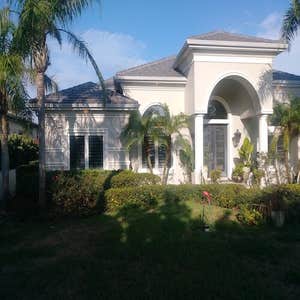Photos by Lewis & Lewis Painting Inc #1 Exterior painted on custom luxury home