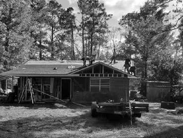 Photos by Service Restoration Pros LLC #1 A tree fell through the roof of this 3 bedroom house during Hurricane Ida. It left several gaping holes and a