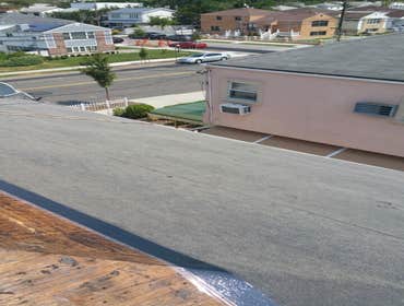 Installing Shingles Roof here we are installing new shingle roof for area approx 950 sq feet.job was done in one day.