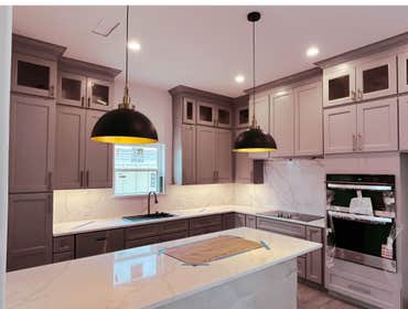 Photos by White Elephant Remodeling LLC #25 Full kitchen and bathroom new build cabinets and Calcutta Quartz, electrical and plumbing, painting floori