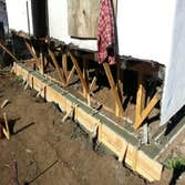 This house was purchased for $50.000 fire damaged and built partially with substandard materials over $100.000 put into rebuild and structual engeering