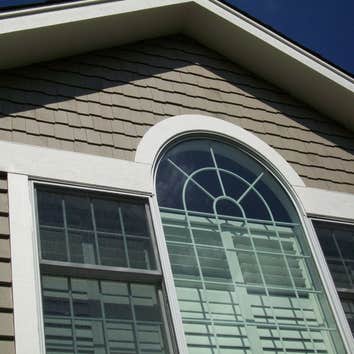 Exterior Facelift These homeowners wanted to enhance the curb appeal of their existing home to create more detail, depth and drama. The budget friend