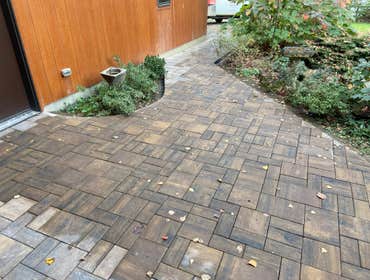 Photos by Steve Danylko Land Service #1 New lawn and landscaping