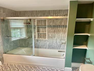 Photos by Lightship Development LLC #1 Complete remodel due to flood. Reconfigured master bathroom floor plan to accommodate over sized walk in shower.