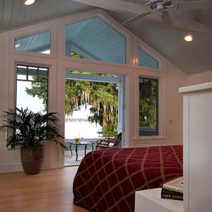 Photos by Robert A. Harris Architect #1 This custom home on Lake Maitland was designed as a "barefoot" house, one that could allow a casual...