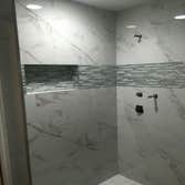 Walk In shower This is a Bathtub bathroom the was transformed into a walk in shower with a bench.