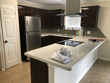 Photos by Grandstone Builders Inc #1 REMODEL TWO BATHROOMS AND REMOVE KITCHEN WALL TO HAVE A OPEN CONCEPT, REMODEL KITCHEN CABINETS WITH GRANITE COUNTE
