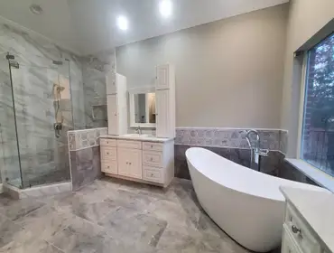 Photos by TruBlue House Care of Allen #6 Master bathroom remodeling: new tile, vanities, countertop, shower, hardware, ultra-clear frame-less glass