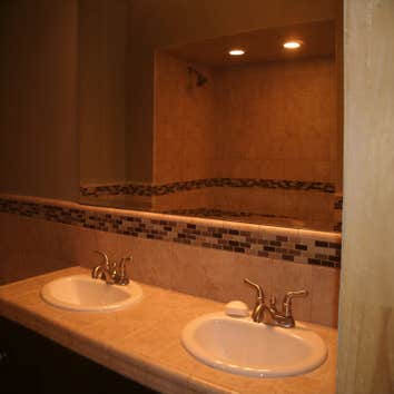 Mason Bathroom remodel with glass tile and Jacuzzi tub.