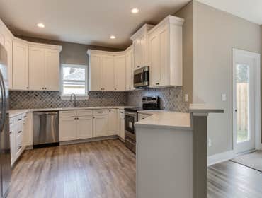 Fernandina Beach - 1576SF, 1 story 3 bed 2 bath Custom Home 1 story 3 bedroom 2 bath 2 car garage, split floor plan with open concept living/dining/kit