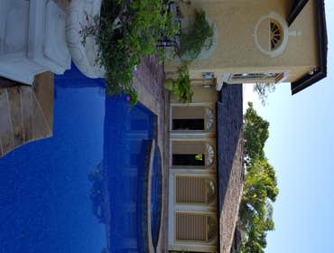 The Villa An exquisite design developed for living and entertainment. This project was built to last for generations having exterior cut stone, custom 