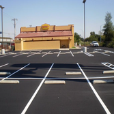 Denny's Seal Coat & Re-Apply Line Striping