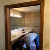 Photos by Ruben Garcia Dba Fast Track Construction #3 Incorporate & convert powder room into free standing tub area with shower next to it. Frameless s