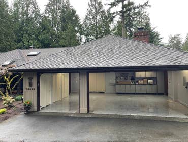 Photos by Maiden Construction LLC #17 Converting a three car garage doors to a double and a single door. Eliminate two supporting roof post to allow fo