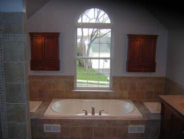 Complete Bathroom Remodel This bathroom was completely remodeled. A custom shower was built with a seat added.