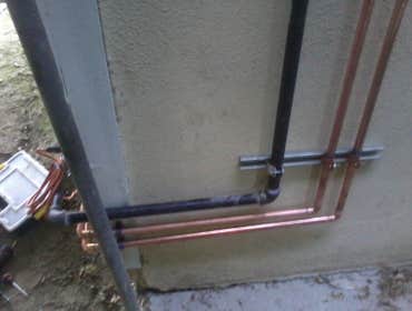 Tankless Water Heater This is the tankless water heater that we installed last week. It is the Takagi T-D2-OS. It produces an impressive 10 Gallons per