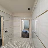 Photos by Rojas Acquisitions LLC #3 Full house remodel, started with the guest bath, relocated toilet, turned bathtub into walk in shower, then started