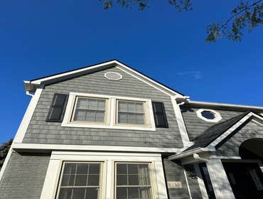 Photos by 614 Exteriors, LLC #38 New Cedar shake siding, complete painting trim and siding