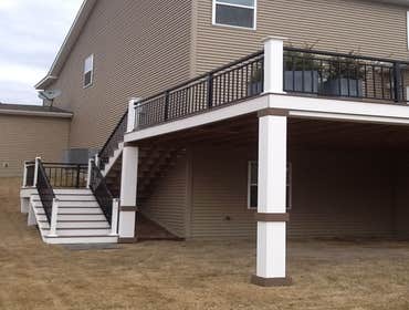 Photos by Custom Home Specialties Inc #2 Timber Tech maintenance free decks with powder coated railings.