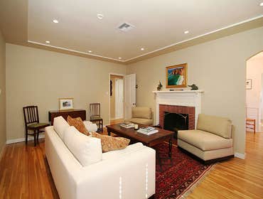 Idaho Interior Project We painted this living room using a custom accent brown around the ceiling and warm tan on the walls