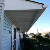 A covered patio we built. This is a covered patio we built. We also extended the overhangs and re shingled the roof. The pics are from start to finish