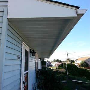 A covered patio we built. This is a covered patio we built. We also extended the overhangs and re shingled the roof. The pics are from start to...