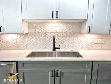 White shaker with Calacata Viatera quartz. White shaker with Calacata Viatera quartz kitchen remodeling in Chicago, IL