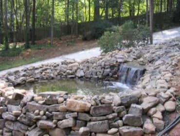 Portfolio of Water Features Some of the water features in our portfolio of completed projects include Twelve-foot waterfalls, multi-tiered water pond s