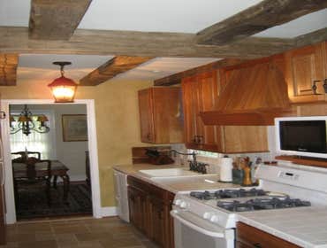 Vienna addition and renovation Took off garage roof and extended 2 bedrooms out over garage, added pront porch, changed the HVAC system to 2 zone syste
