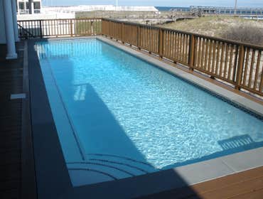 Patricks Pools Photos Patrick's Pools Inc is a swimming pool contractor serving Eastern Long Island. We specialize in elite gunite and vinyl pool insta