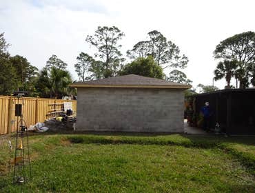 sales@bdi-homes.com We removed a Metal building from existing slab and constructed a 600sf block garage with a conventionally framed roof, Manual garag