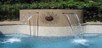 Photo(s) from CUSTOM DERIAN POOLS Infinity Pools, Hillside Pools, Landscaping, BBQs, Outdoor Fireplaces, Shade structures, Pergolas, Landscaping, Mason