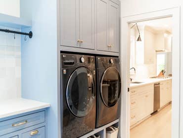 Photos by Albrecht, LLC #1 Through strategic space planning, thoughtful material selections, and custom craftsmanship, this first-floor renovation tran