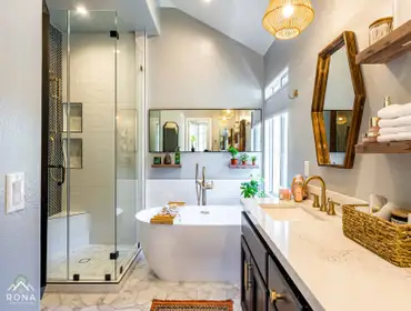 Thousand Oaks Bathroom Remodel We turned this Thousand Oaks bathroom into your spa-like retreat! Imagine a dark navy double vanity with brass handles a