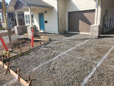 Photos by Silva Engineering Construction #1 Demo, excavate, rock, form, and pour walkway, driveway , and driveway approach for client.