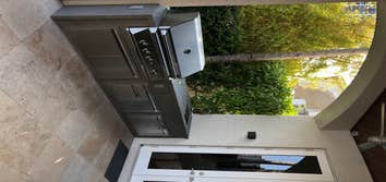 Photos by Woodpeckers Solutions Llc #2 10' BBQ Island, Twing Eagles 42" BBQ, Twin eagles access doors, ITOPKER storm negro countertops, electrical and 