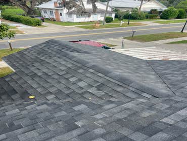 Photos by Heritage Construction Services LLC #1 Tear off existing shingles. Repair all rotten wood. Installed all new underlayment, architectural shing