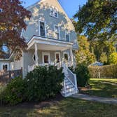 Photos by Peter James Harrahy #1 Remove existing porch and rebuild new maintenance. Free porch and roof to match the style of the house