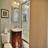 Project photos from Johnson Construction And Restoration LLC Small bathroom remodel before and after, with white subway tile shower, with marble and gl