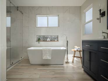 Photos by Cj Builders #2 Remodeled a 1950's Master bathroom. Scope was to enlarge, update and give a wow factor this master bathroom. We removed walls