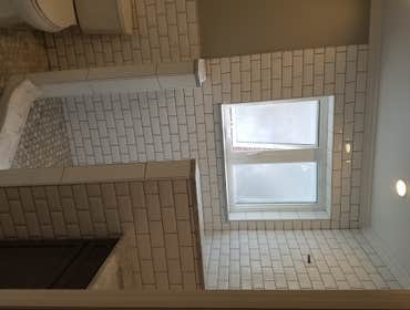 Subway Tile Shower And Marble Floor