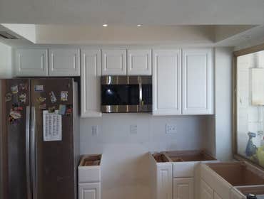 Photos from Love Remodeling Llc Built in custom entertainment center and custom oak floating shelves