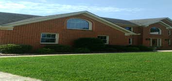 New roof, replacement windows, exterior trim and seamless gutters.