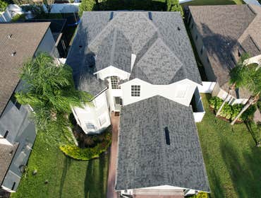 Photos by WOODSTONE ROOFING
